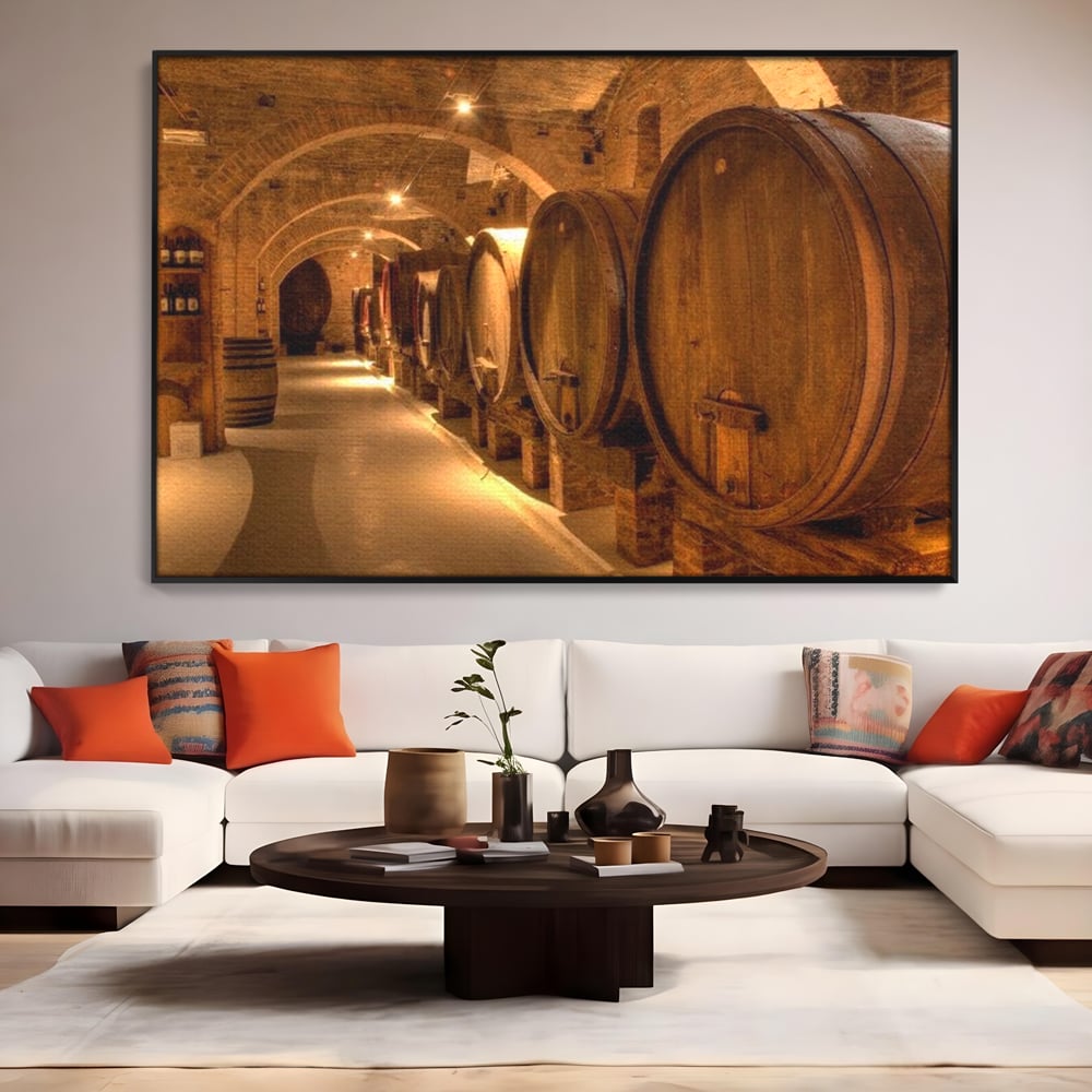 Tablou canvas cu tablou canvas cu butoaie de vin in crama, in rama de aluminiu negru, pe perete intr-un living